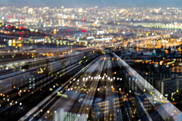 istock Train track moving over night city light 950321944