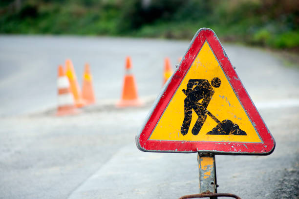 istock Road works ahead, traffic cones 950322672