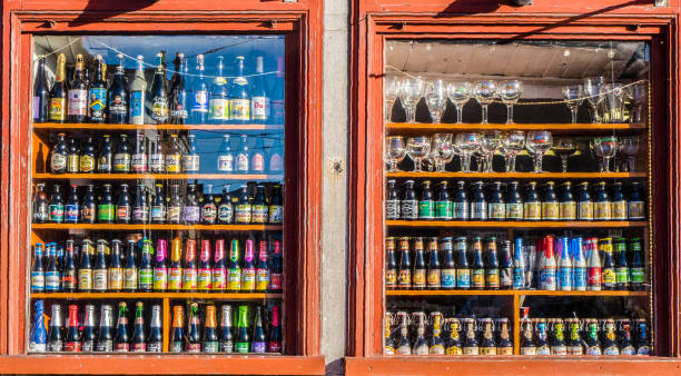 London, UK - 21 March, 2018: color image depicting the illuminated window retail display of a specialist boutique tea shop near Covent Garden in London, UK. The window display is decorated with all kinds of paraphernalia relating to tea - including a range of different teapots, tea cups and of course many varieties of tea, from China and Japan. Room for copy space.