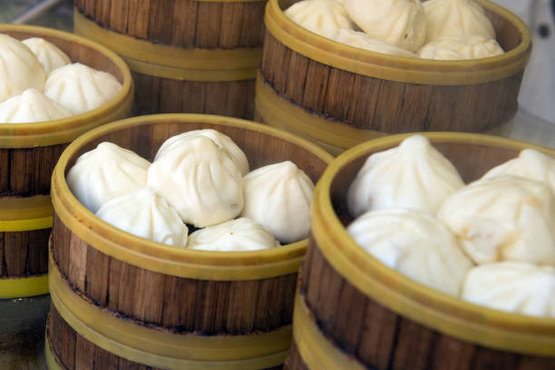 istock Chinese style bun in wooden steamer 950327522