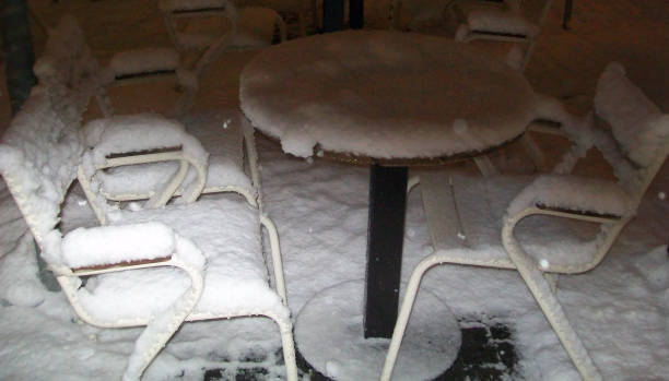 istock Outdoors Restaurant Dining Table Covered With Snow During Heavy Winter Season 950329806