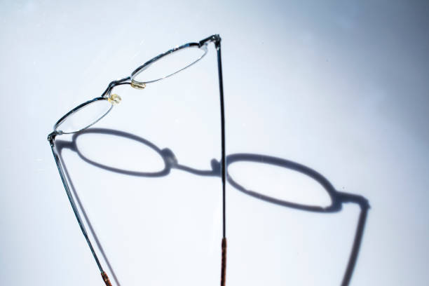 istock Longsighted eye glasses isolated on white background, Light and shadow 950332936