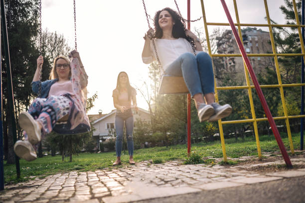 istock Swinging fun at the park 950333118