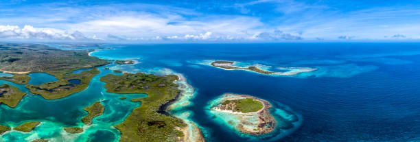 Aerial panoramic view of Caribbean Cays, Islands and the coastline Aerial panoramic view of Caribbean Cays, Islands and the coastline at Morrocoy National Park, Venezuela bahamas photos stock pictures, royalty-free photos & images