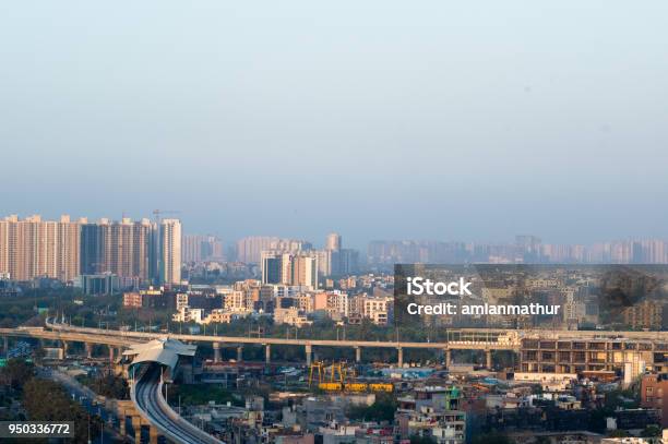 Noida Delhi Cityscape With Buildings And Metro Station Stock Photo - Download Image Now