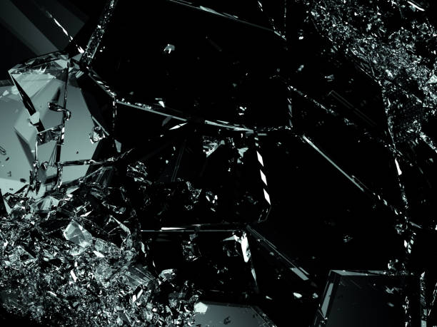 istock Splitted or cracked glass on black 950341118