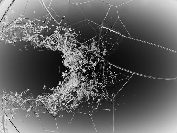 istock Broken and cracked shapp glass on black 950341554