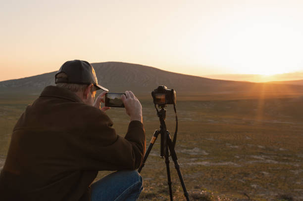 istock Nature photographer in mountains 950345390