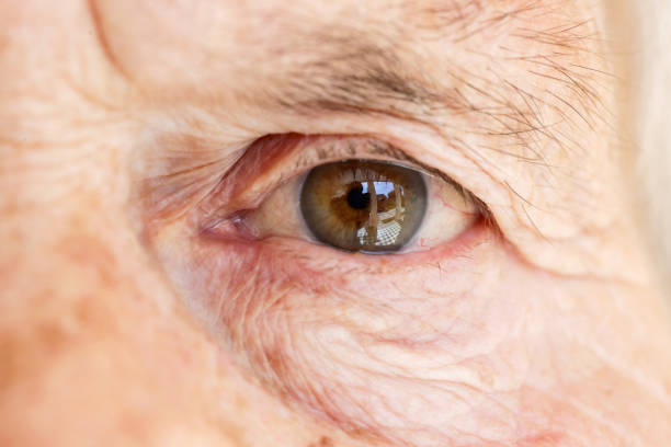 istock Close-up image of old woman's eye, looking at camera 950347052