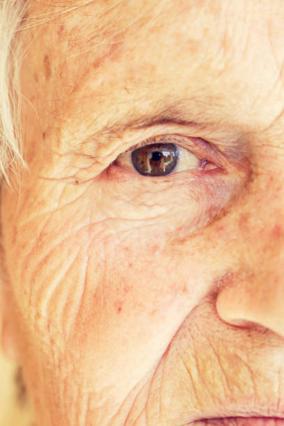 istock Close-up image of old woman's eye, looking at camera 950347128