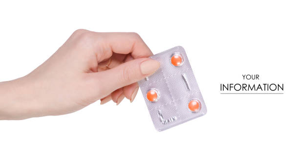 istock Medicine pills in blister, drug tablets in hand pattern 950353648