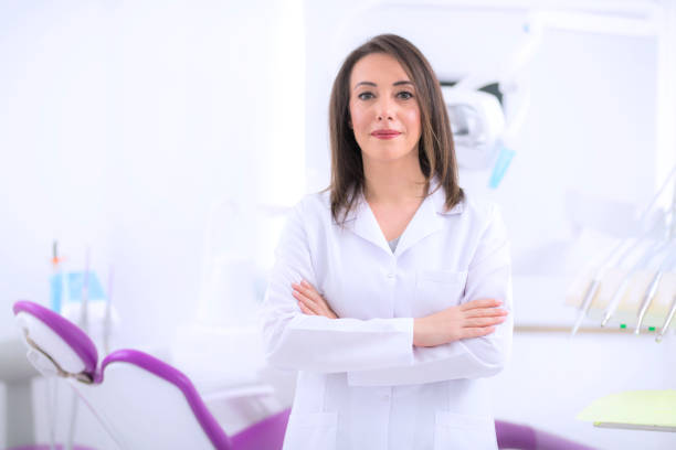 istock Dentist woman at dental office 950356320