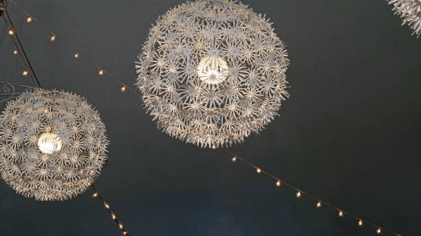 istock Party lights hanging from reception tent 950357930