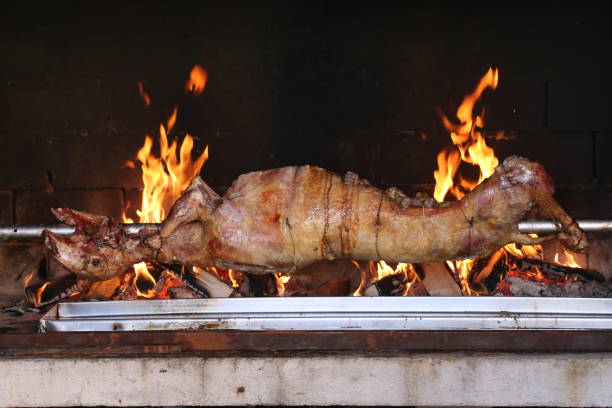 istock The carcass of the goat is fried on a spit 950363060