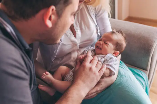 Photo of cute newborn baby crying