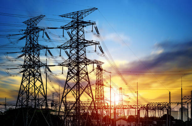 High pressure wire tower at sunset at dusk High pressure wire tower at sunset at dusk electricity substation photos stock pictures, royalty-free photos & images