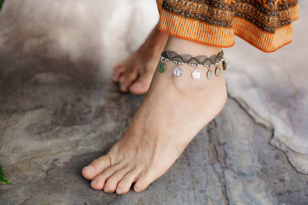 istock Female ankle with bracelet 950367772