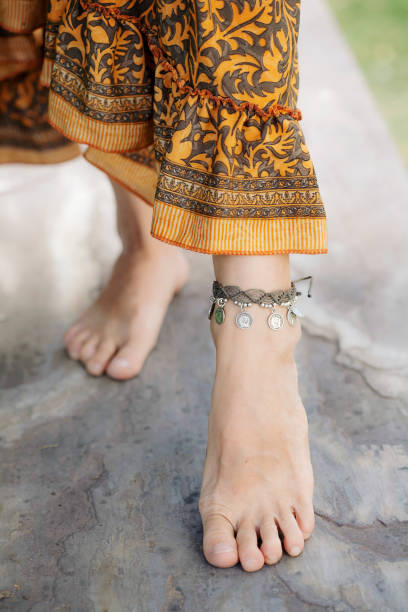 istock Female ankle with bracelet 950367812