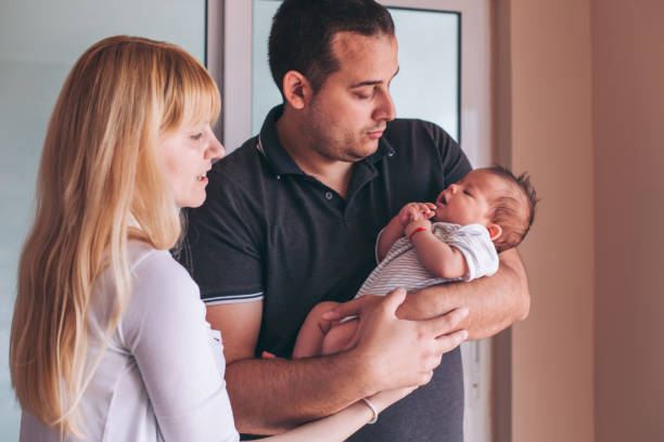 istock Young family with baby 950367918