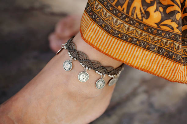 istock Female ankle with bracelet 950368132