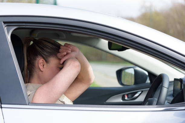istock Woman driver scared shocked whilst driving 950368340