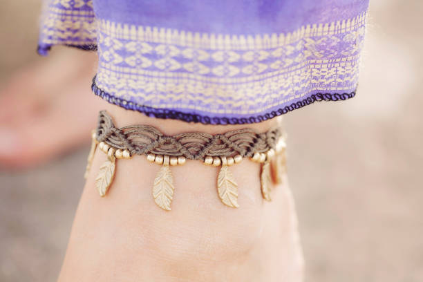 istock Female ankle with bracelet 950368462