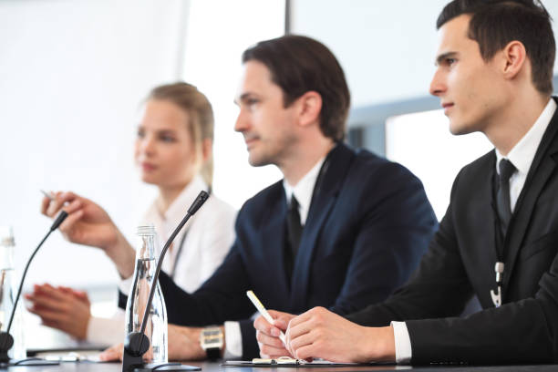 istock Speakers at business meeting 950376064