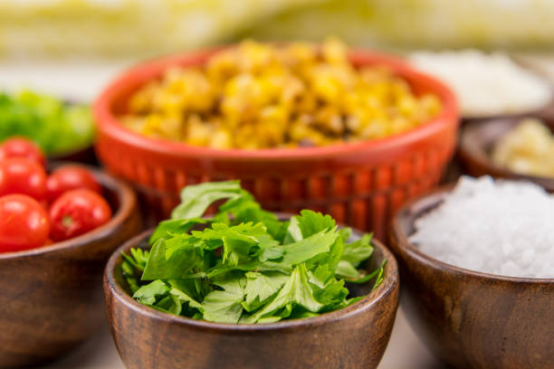 Chopped Cilantro in Wooden Bowl
