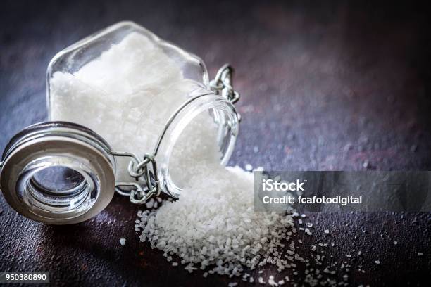 Coarse Grained Sea Salt In A Glass Container Stock Photo - Download Image Now - Salt - Seasoning, Salt - Mineral, Sodium