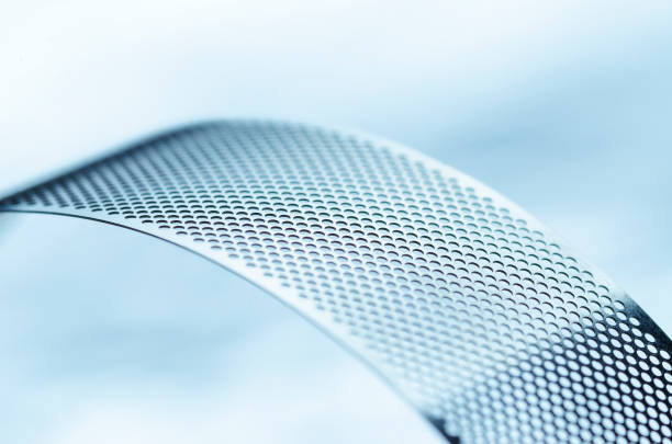 istock Shiny metal perforated tape 950387820