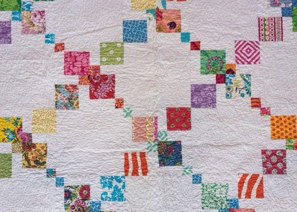 White Quilt with Diagonal Colorful Accents
