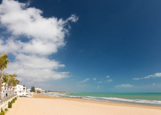 istock A wide sandy beach seen from a promenade 950407666