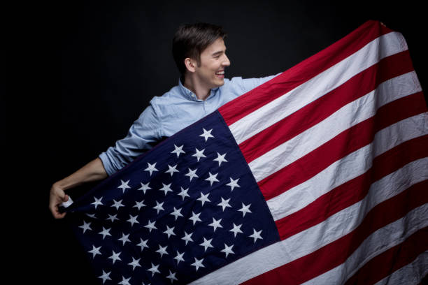 istock Happy man wearing the American Flag 950408624