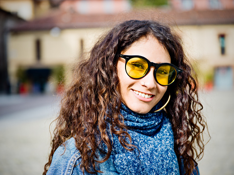 Portrait of young Latin American woman outdoors