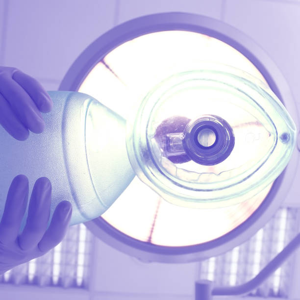 istock Gloved hand with ventilator bag in the surgery room 950412588