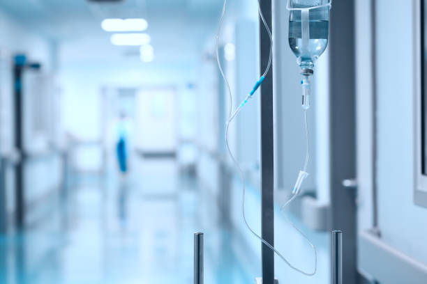 istock Intravenous drip system in the hospital lobby 950412814