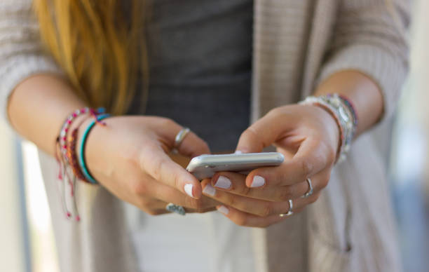 istock Teenager with phone device 950417142
