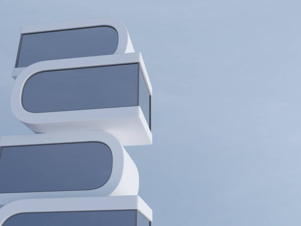 istock 3D rendering of futuristic skyscraper architecture design with smooth shape on blue clear sky background,Concept of minimal glass and white building. 950422244