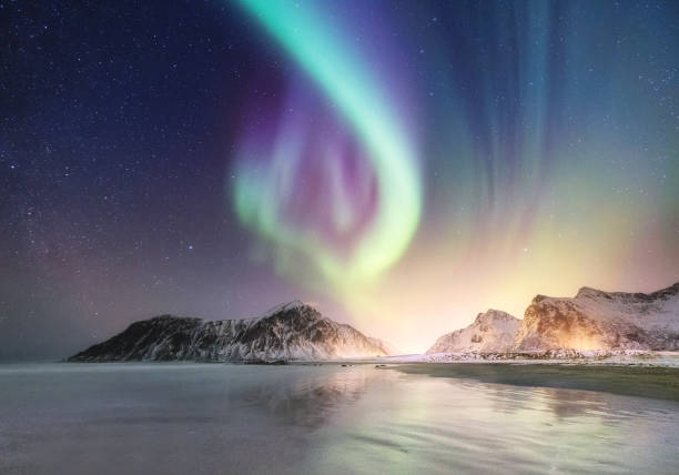 northen light on the arctic beach. beautiful natural landscape in the norway - tromso fjord winter mountain imagens e fotografias de stock