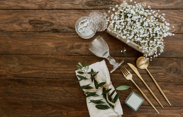 istock Wedding table decoration in rustic style on wooden background. Top view, flat lay, copy space 950436634