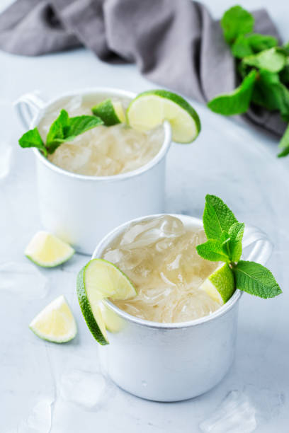 istock Moscow mule cocktail with vodka, ginger beer, lime and mint 950438028