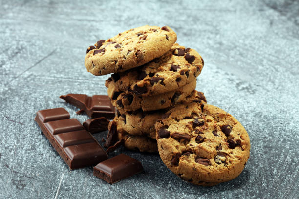 istock Chocolate cookies on rustic table. Chocolate chip cookies 950438190