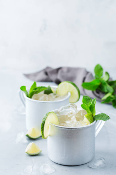 istock Moscow mule cocktail with vodka, ginger beer, lime and mint 950438902