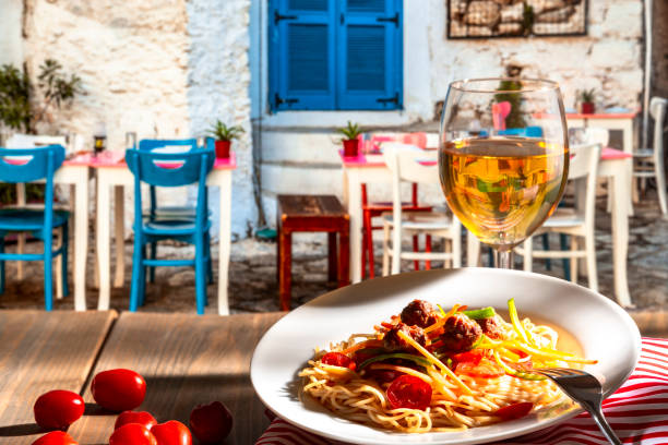 istock Pasta with a plate of sauce on the table in Greece. 950439078