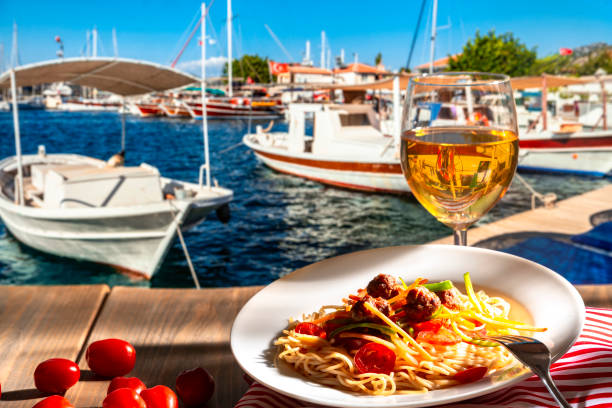 istock Pasta with a plate of sauce on the table in Greece. 950442074