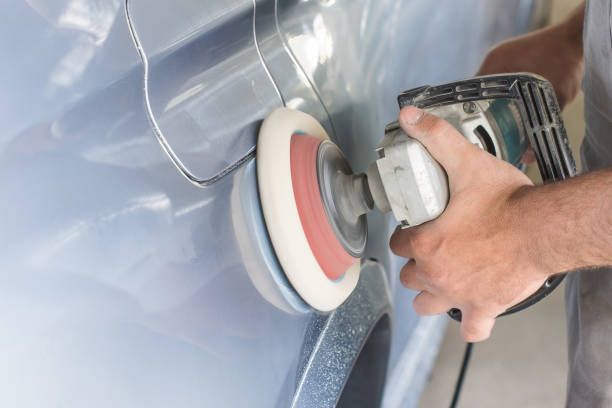 istock The master polishes the car. 950445432
