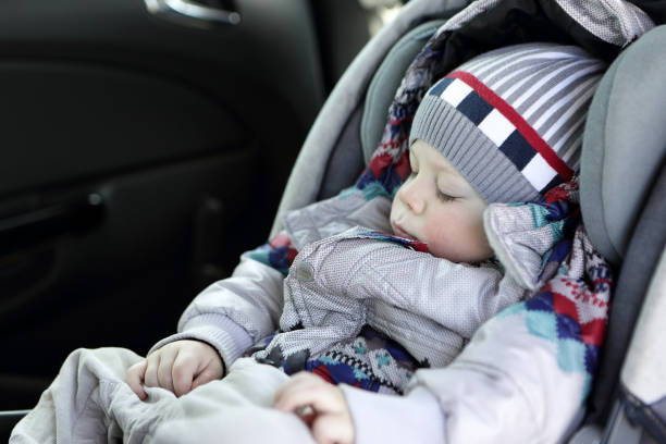 istock Toddler sleeping in baby car seat 950447192