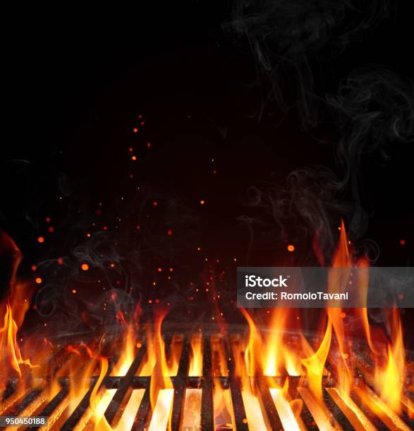 Grill Barbecue Background Empty Grate With Flames On Black Stock Photo - Download Image Now