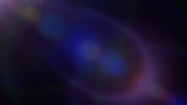 istock intense colorful and mainly off screen lens flare overlay texture with bokeh effect with black background 950451492