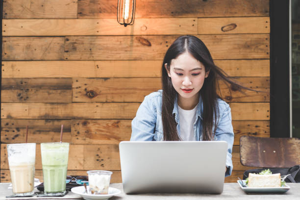 istock Woman working and enjoy online social connection on laptop computer 950455390